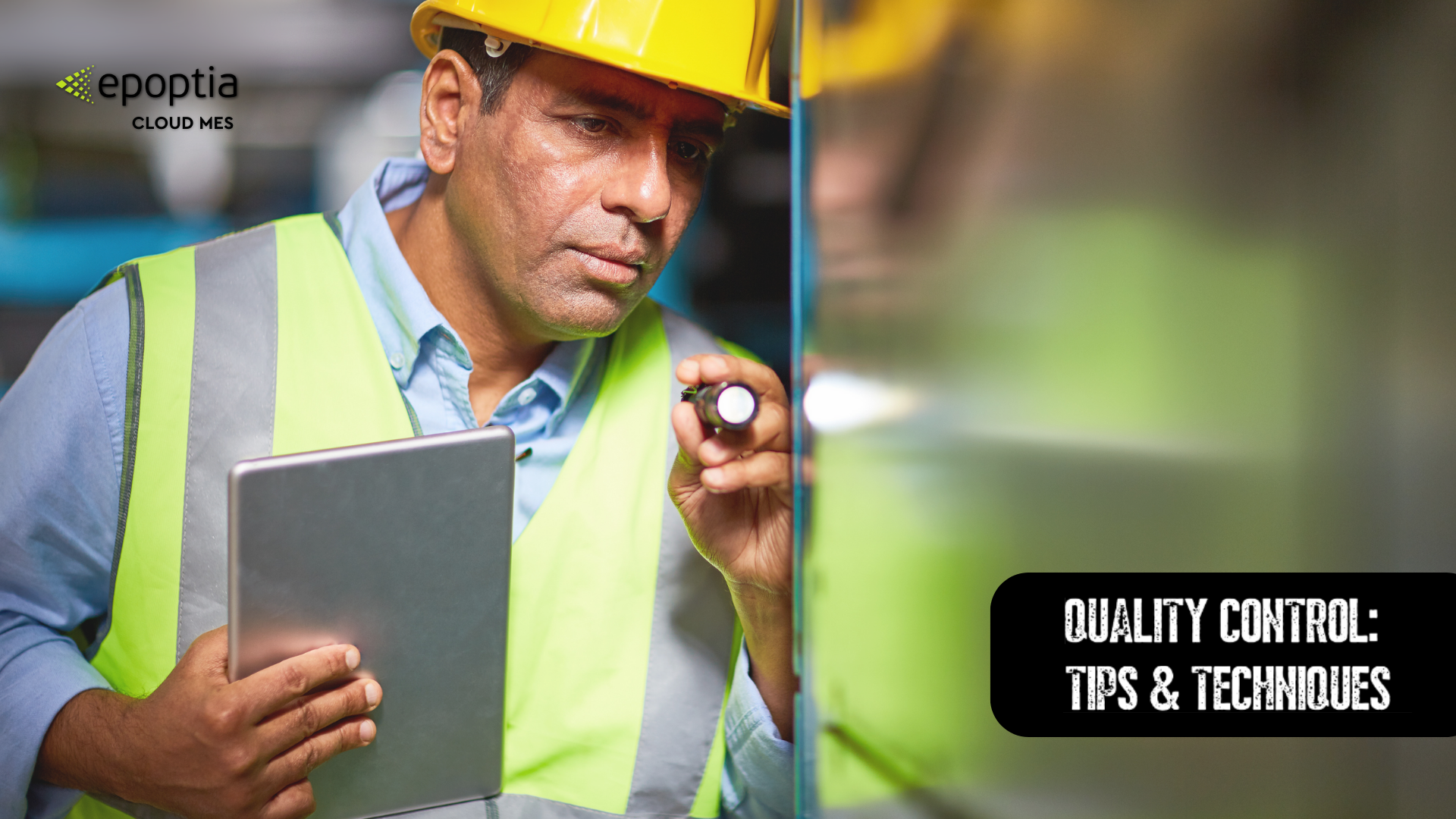 A worker inspecting quality control standards in manufacturing